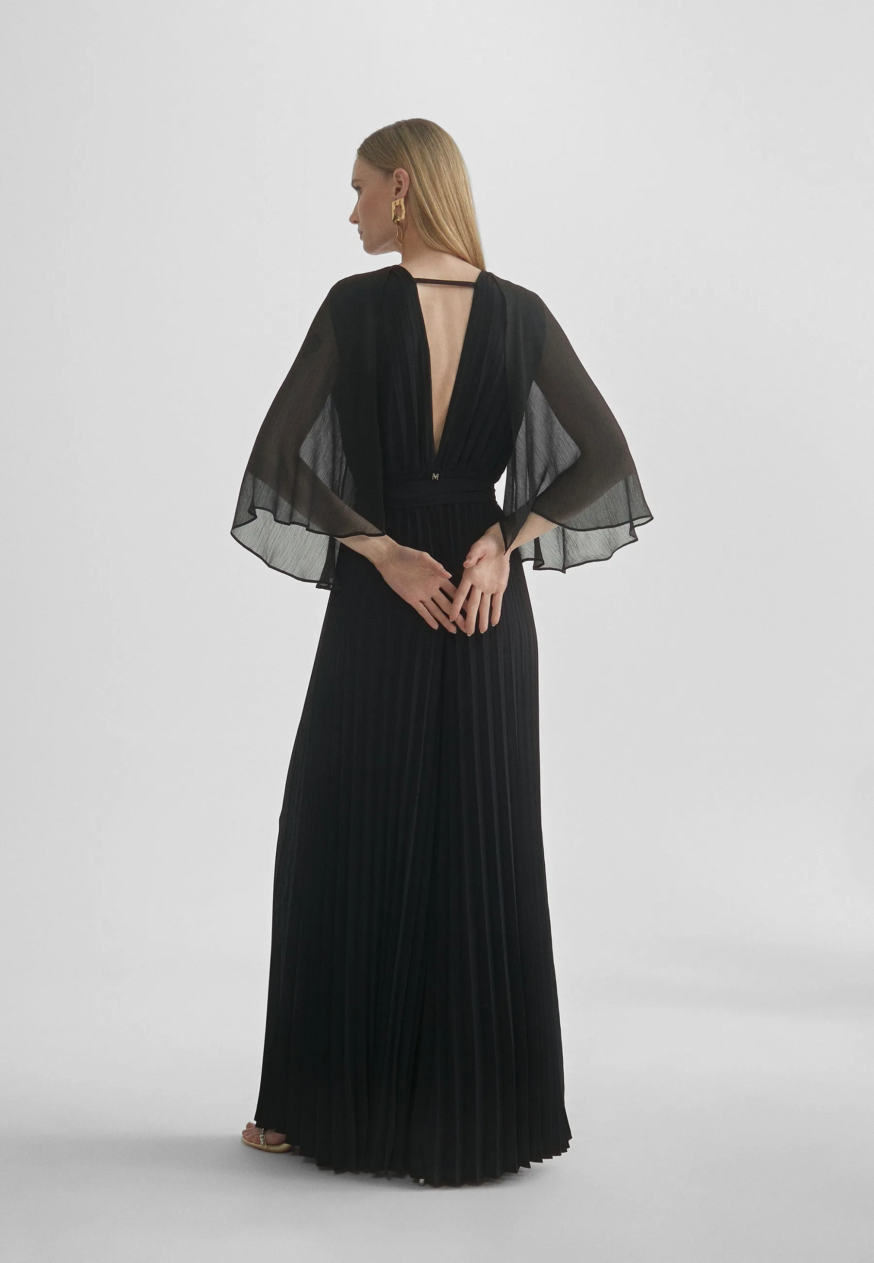 Pleated jumpsuit with cape sleeves